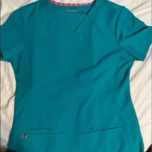 Gently used turquoise scrubs
